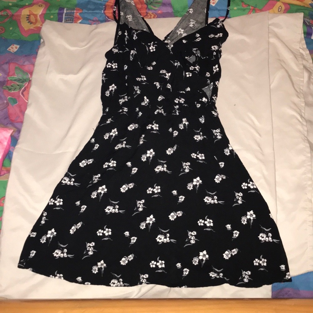 Black dress with white flowers.
